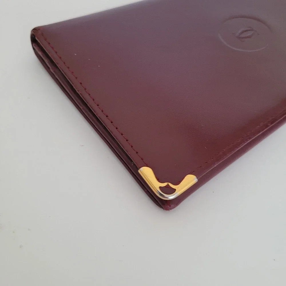 Cartier Must de Cartier Burgundy Leather Long Bifold Wallet Gold Corners Italy